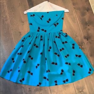 Amanda Uprichard strapless “sunglasses” dress